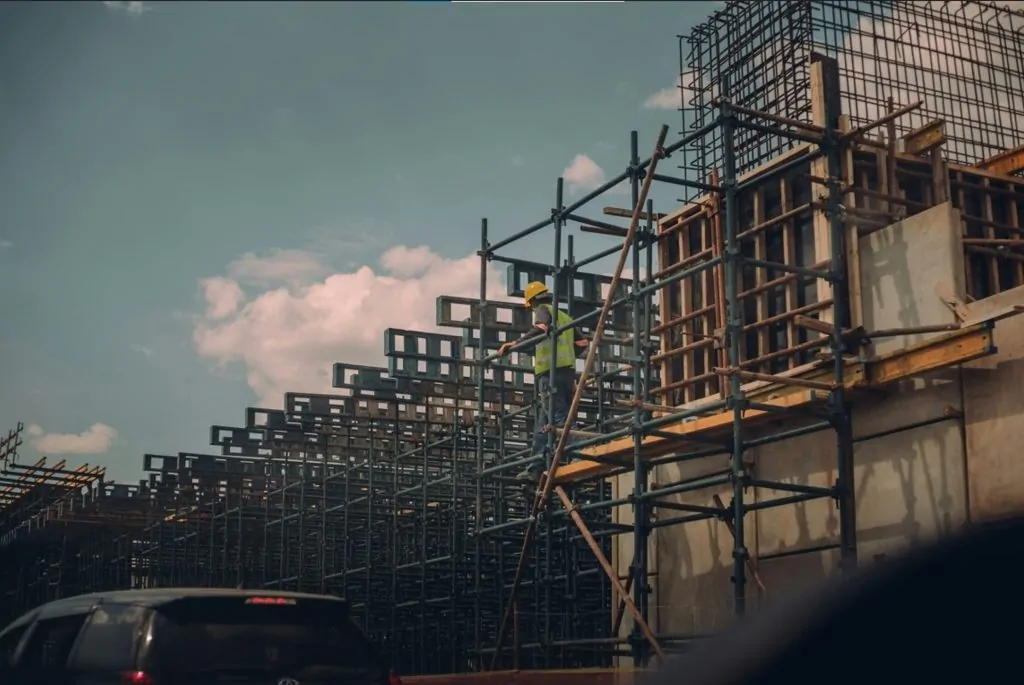 The photo shows a building under construction in Gaborone.